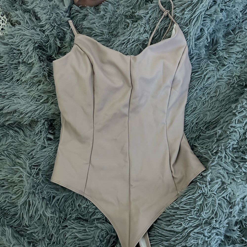nude leather bodysuit